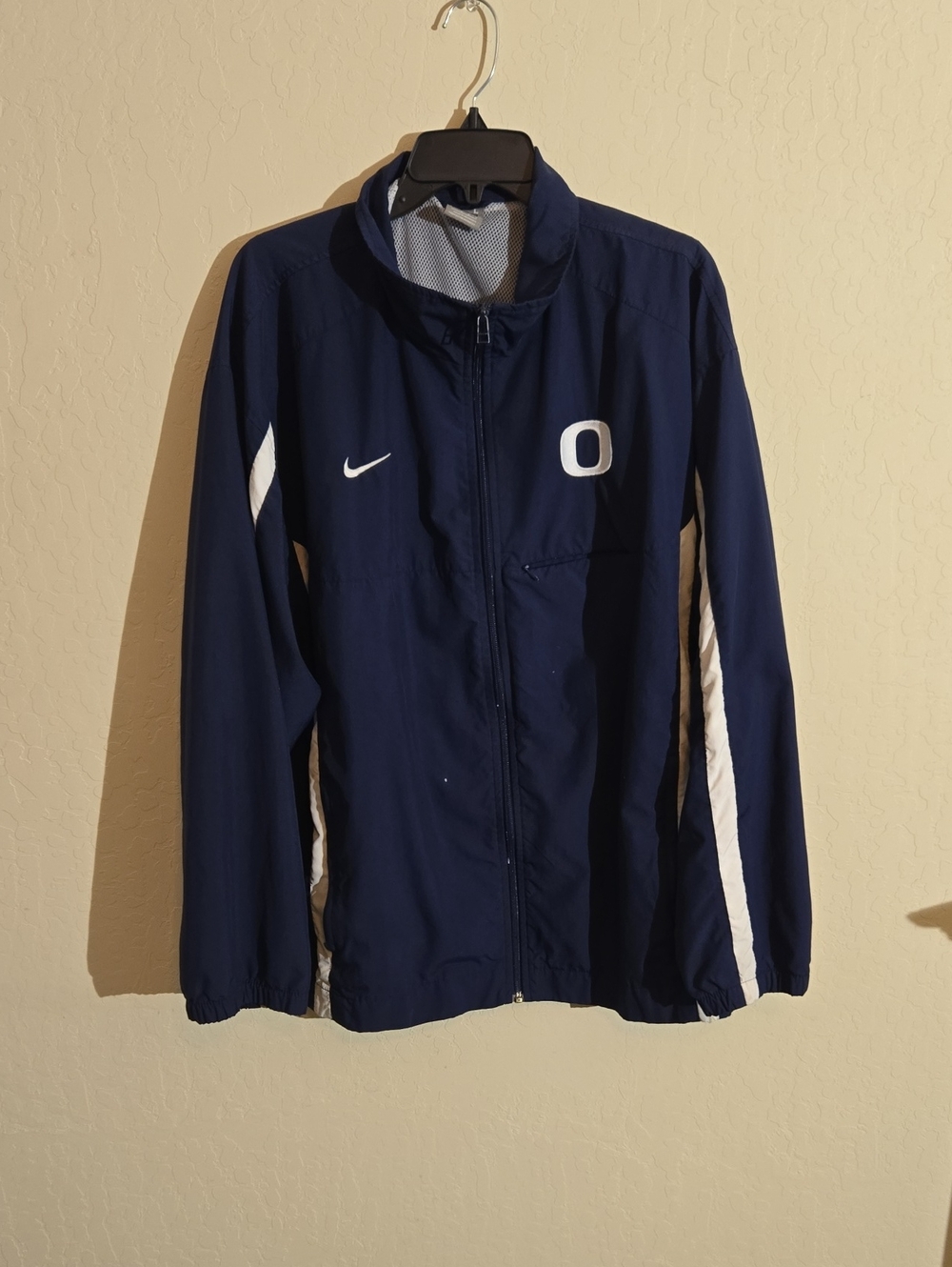 Nike Navy Blue Track Jacket with White Stripe Details